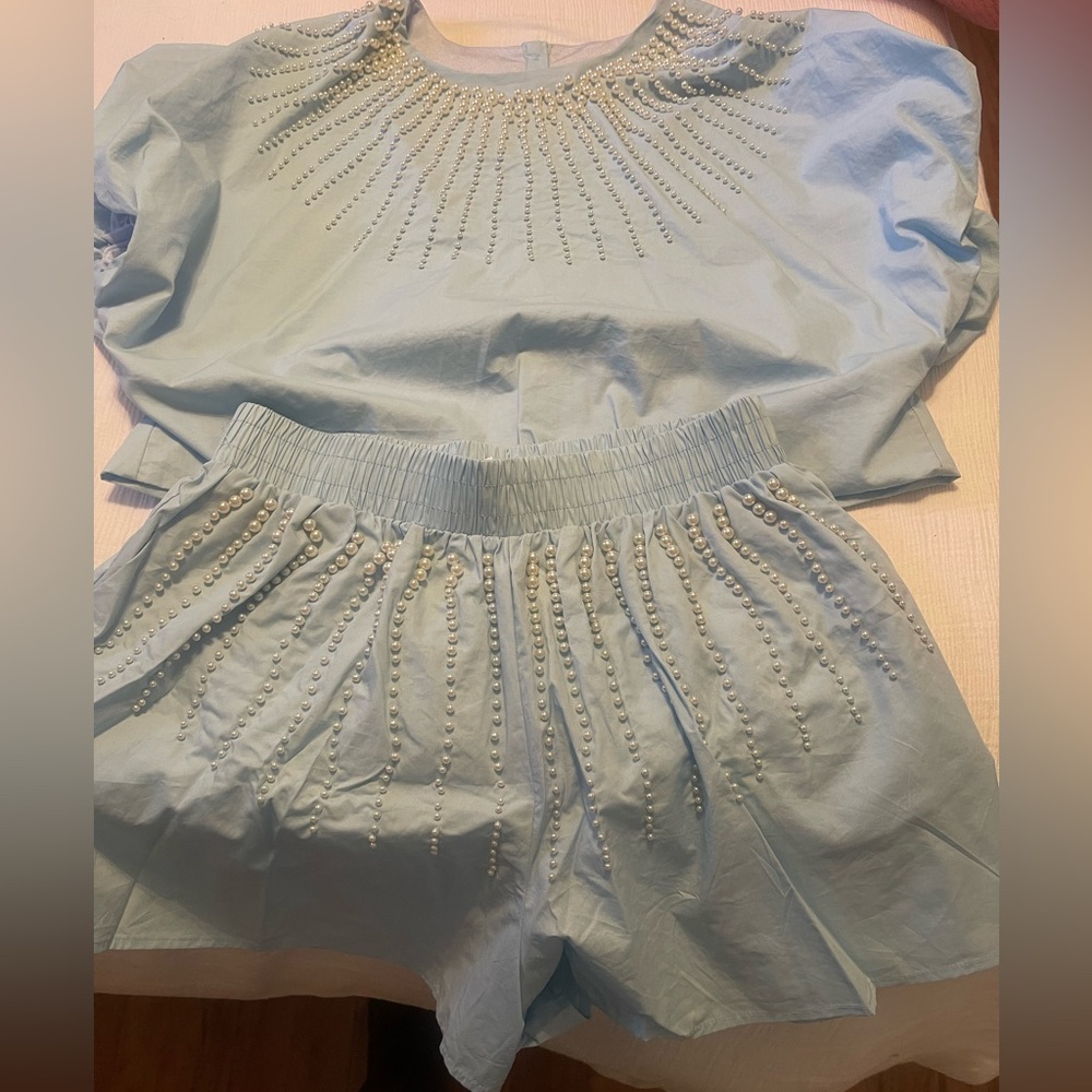 Queen of Sparkles light blue with pearls short set.